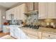 Well-equipped kitchen with granite countertops and a gas cooktop at 1103 Ridenour Ct, Kennesaw, GA 30152