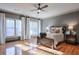 Spacious main bedroom with hardwood floors, large windows, and plenty of sunlight at 1103 Ridenour Ct, Kennesaw, GA 30152