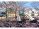 Community playground with slides, climbing structures, and safe surface at 1103 Ridenour Ct, Kennesaw, GA 30152