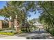 Gated entrance to a beautiful community with lush landscaping at 15 Independence Nw Pl, Atlanta, GA 30318