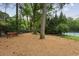 Relaxing dog park with wood chips and benches at 15 Independence Nw Pl, Atlanta, GA 30318