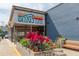 Gezzo's Coastal Cantina storefront with vibrant red plants at 15 Independence Nw Pl, Atlanta, GA 30318