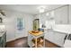 Modern white kitchen with stainless steel appliances and island at 15 Independence Nw Pl, Atlanta, GA 30318