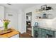 Kitchen with open shelving and view into living area at 15 Independence Nw Pl, Atlanta, GA 30318