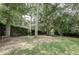 Park-like setting with a bench and lush trees at 15 Independence Nw Pl, Atlanta, GA 30318