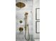 Shower with marble tile and gold fixtures at 15 Independence Nw Pl, Atlanta, GA 30318