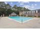 Inviting community pool with surrounding brick and lounge chairs at 15 Independence Nw Pl, Atlanta, GA 30318