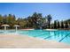 Resort-style pool with a waterslide at 150 Auburn Depot Dr, Auburn, GA 30011