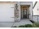 Dark gray front door with glass panels and a wreath at 150 Auburn Depot Dr, Auburn, GA 30011