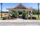 Community gazebo with stone accents, manicured landscaping, and ample space for relaxation and gathering at 150 Auburn Depot Dr, Auburn, GA 30011