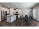 Open concept kitchen with island and stainless steel appliances at 150 Auburn Depot Dr, Auburn, GA 30011