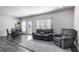 Relaxing living room featuring gray recliner chairs and a rug at 150 Auburn Depot Dr, Auburn, GA 30011