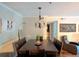 Bright dining area with chandelier and view of living room at 2710 Se Cumberland Court, Smyrna, GA 30080