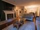 Living room with fireplace and view of dining area at 2710 Se Cumberland Court, Smyrna, GA 30080