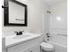 Clean bathroom with a white vanity and shower/tub combo at 2966 Knollberry Ln, Decatur, GA 30034