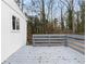 Grey deck with wooden railings overlooking backyard at 2966 Knollberry Ln, Decatur, GA 30034