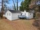 Rear view of house, showing deck and landscaping at 2966 Knollberry Ln, Decatur, GA 30034