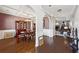 Elegant dining room with hardwood floors and a beautiful chandelier at 527 Mossycup Dr, Fairburn, GA 30213