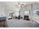 Open living space with fireplace and views into bedroom at 527 Mossycup Dr, Fairburn, GA 30213