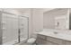 Bathroom features a large shower, toilet, and vanity with sink at 575 Silver Moon Dr, Loganville, GA 30052