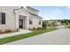 Front entrance of a two-story home with gray brick exterior and landscaping at 575 Silver Moon Dr, Loganville, GA 30052