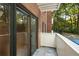 Private balcony with slate tile flooring and sliding glass doors at 109 Ridley Howard Ct, Decatur, GA 30030