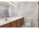 Clean bathroom with double sink, and shower. Features updated vanity at 109 Ridley Howard Ct, Decatur, GA 30030