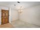 Simple dining area with hardwood floors and chandelier at 109 Ridley Howard Ct, Decatur, GA 30030