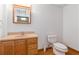 Simple basement bathroom with toilet and vanity at 170 Amicalola Way, Jonesboro, GA 30236