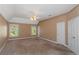 Large bedroom with carpeted floors and ample natural light at 170 Amicalola Way, Jonesboro, GA 30236