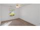 Simple bedroom with carpeted floor and a window at 170 Amicalola Way, Jonesboro, GA 30236