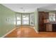 Bright breakfast nook with hardwood floors and bay window at 170 Amicalola Way, Jonesboro, GA 30236