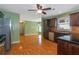 Modern kitchen with stainless steel appliances and hardwood floors at 170 Amicalola Way, Jonesboro, GA 30236