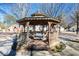 Community gazebo with swings and benches, perfect for relaxing outdoors at 175 Robin Ct, Fayetteville, GA 30215