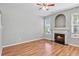 Living room with hardwood floors, fireplace, and natural light at 2297 Elmbridge Rd, Buford, GA 30519