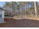 Private backyard with wooded view and seating area at 4334 Austin Farm Trl, Acworth, GA 30101