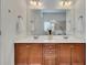 Double vanity bathroom with marble countertops and modern fixtures at 4334 Austin Farm Trl, Acworth, GA 30101