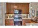 Kitchen features granite counters, stainless steel appliances at 4334 Austin Farm Trl, Acworth, GA 30101