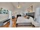 Large main bedroom with hardwood floors and ceiling fan at 4334 Austin Farm Trl, Acworth, GA 30101