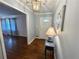 Inviting entryway with hardwood floors and light blue walls at 5791 Warren Farm Sw Rd, Powder Springs, GA 30127