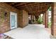 Brick patio with access from basement, offering outdoor space at 1440 Eugenia Terrace, Lawrenceville, GA 30046