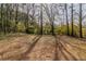 Large backyard with mature trees and ample space at 4083 Thetford Ct, Decatur, GA 30035