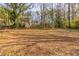 Wooded backyard offering privacy and natural beauty at 4083 Thetford Ct, Decatur, GA 30035