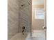 Bathroom with marble tile shower/tub combo at 4083 Thetford Ct, Decatur, GA 30035