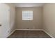 Simple bedroom with neutral walls and carpet flooring at 4083 Thetford Ct, Decatur, GA 30035