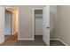 Well-lit bedroom with a spacious closet and carpet flooring at 4083 Thetford Ct, Decatur, GA 30035