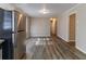 Dining area adjacent to kitchen with vinyl plank flooring at 4083 Thetford Ct, Decatur, GA 30035