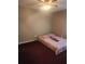 Bedroom with ceiling fan and burgundy carpet at 2210 Burdett Ridge, Atlanta, GA 30349