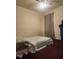 Bedroom with ceiling fan and burgundy carpet at 2210 Burdett Ridge, Atlanta, GA 30349