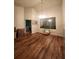 Dining room with hardwood floors, modern chandelier and large mirror at 2210 Burdett Ridge, Atlanta, GA 30349